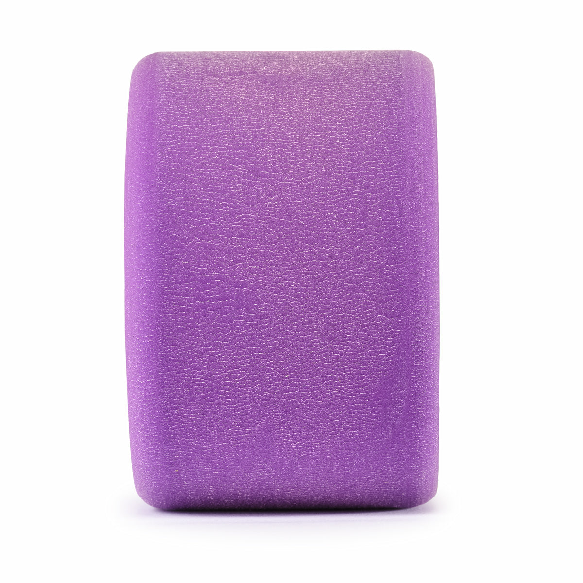 A rectangular purple yoga block with a textured surface.